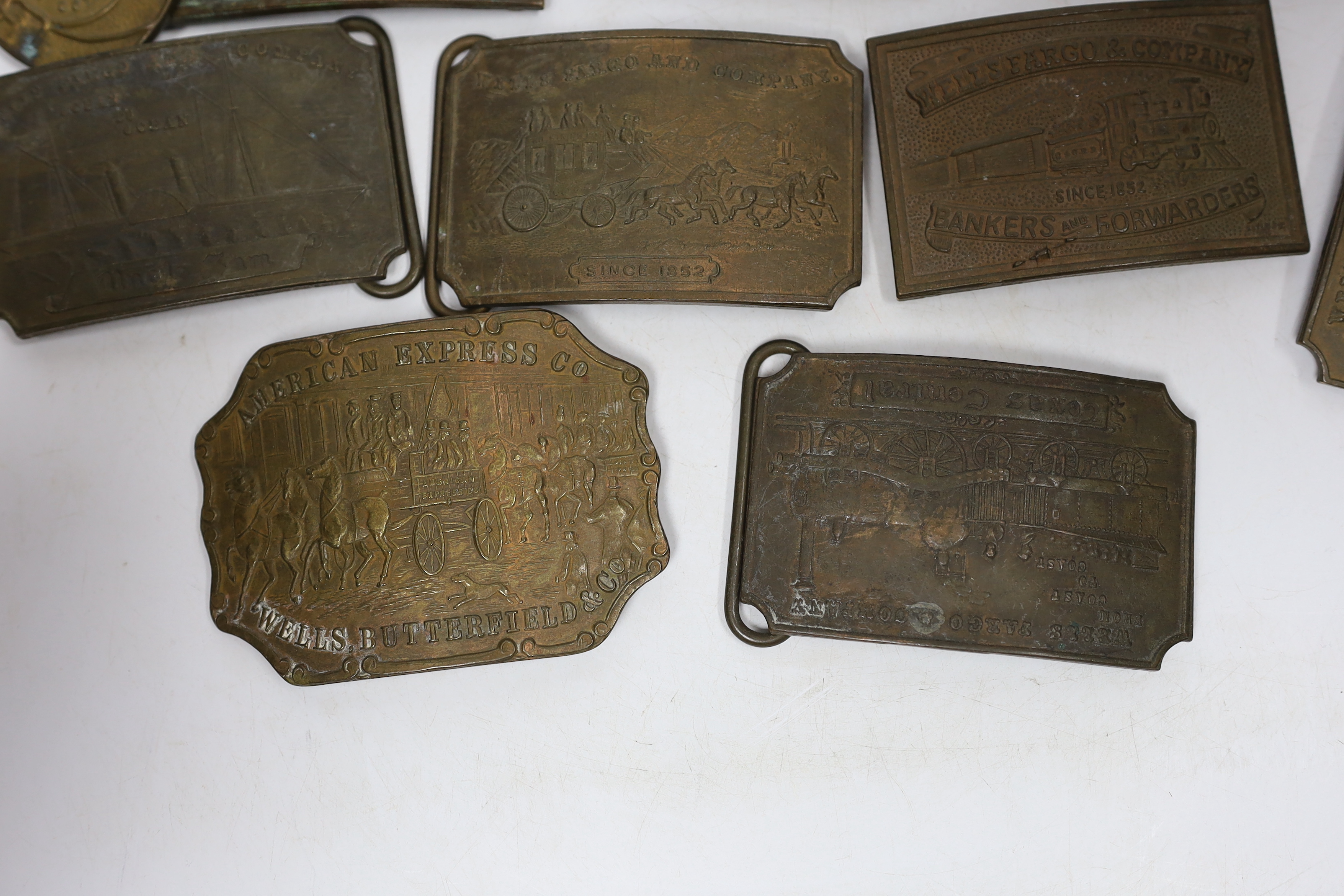 A collection of Wells Fargo and similar belt buckles, mostly by Tiffany & Co.